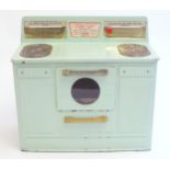 Toys: An American child's tinplate retro ' Little Lady ' cooker / stove, by Empire, with an