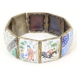 A late 19thC / early 20thC Indo-Persian bracelet set with decorative enamel links depicting figures,