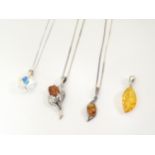 Assorted silver and white metal jewellery comprising three necklaces set with various pendants and