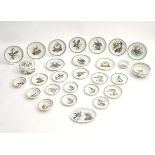 A quantity of assorted Portmeirion dinner wares decorated in the Birds of Britain pattern, to