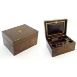 A Victorian rosewood work box with brass edging, a fitted internal tray and concealed side drawer.