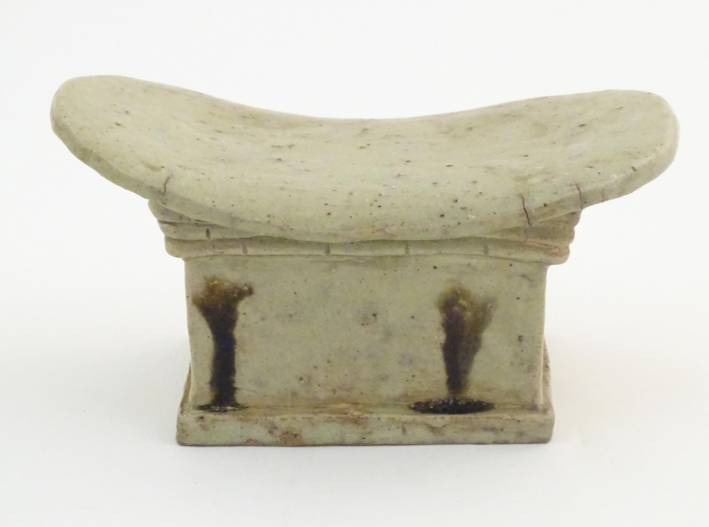 An Oriental stoneware neck pillow / headrest with architectural / building detail. Approx. 4 1/4" - Image 5 of 6