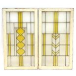 Two Art Deco stained glass window panes / panels with geometric and chevron detail. Approx. 35" x 17