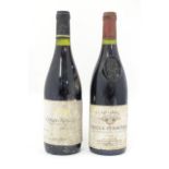 A bottle of Delas Freres Les Launes Crozes-Hermitage 1994 red wine, together with a bottle of