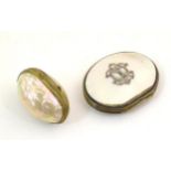A late 19th / early 20thC coin purse with mother of pearl covers with applied scrolling detail and