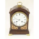 A 20thC small proportion mahogany bracket clock, in the Regency style, with white enamel dial and