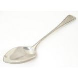 A silver table spoon hallmarked London 1803, maker WE. Approx 9" long Please Note - we do not make