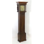 A Late 18thc / early 19thCoak Long case clock with brass dial and 8-day movement. Approx. 82" tall
