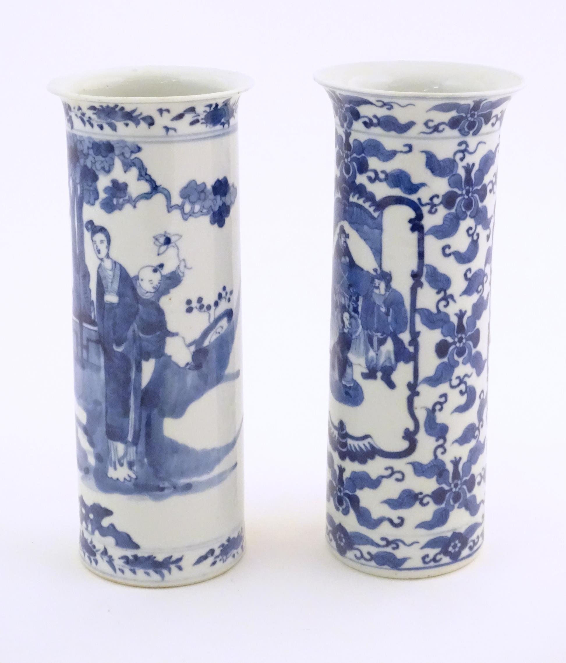 Two Oriental blue and white vases of cylindrical form, one depicting figures in a garden scene - Image 4 of 6