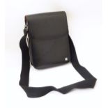 Luggage / Leather bag: A Dunhill black leather crossbody messenger bag. Approx. 10 3/4" x 8"