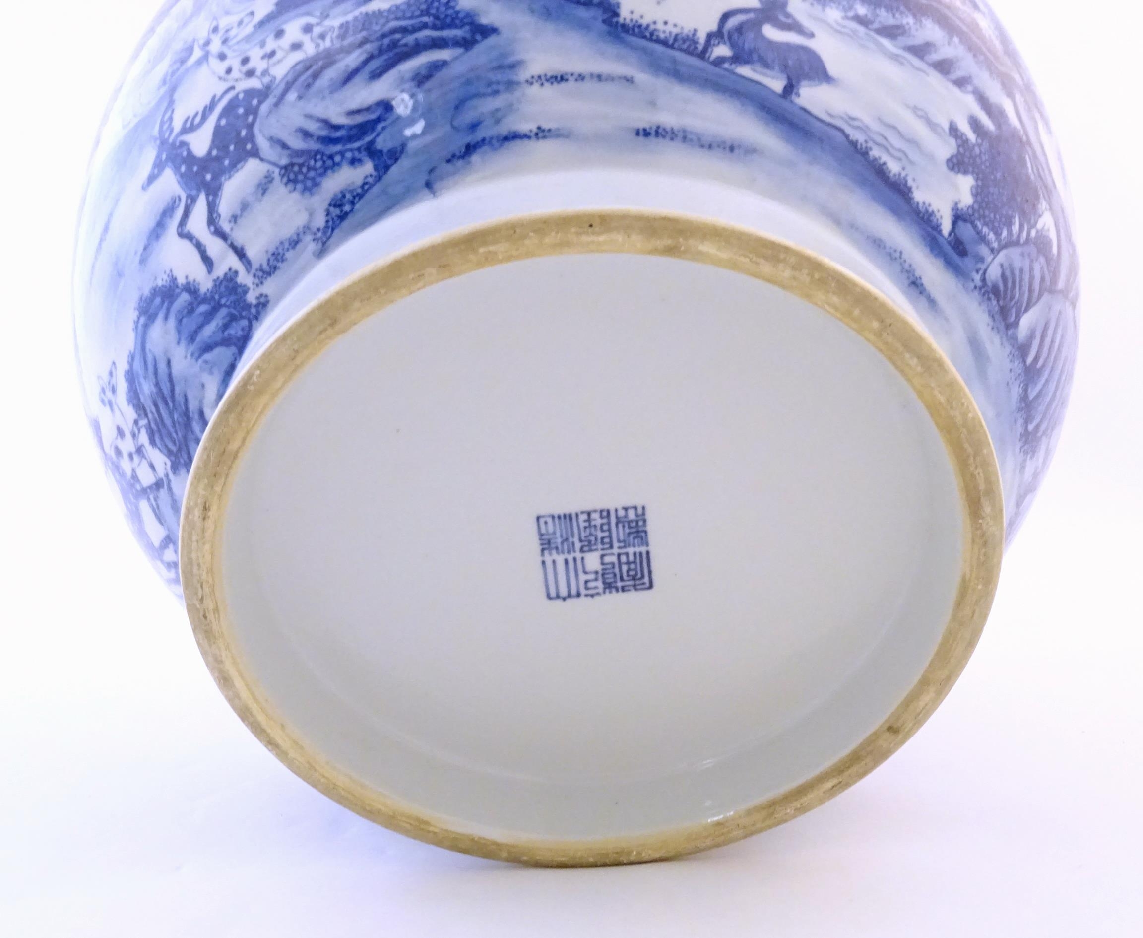 A large Chinese Hu vase with scrolled twin handles, the body decorated in blue and white with the - Image 9 of 9