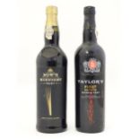 A 75cl bottle of Dow's Midnight port, together with a 75cl bottle of Taylors First Estate reserve