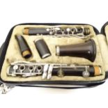 Musical Instrument: a mid 20thC Boosey & Hawkes clarinet, of turned hardwood construction,