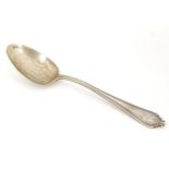 A silver teaspoon, hallmarked Sheffield 1924, maker Mappin and Webb. Approx. 5 3/4" long Please Note