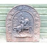 A 19thC continental cast iron fireback, of arch form and decorated with knight on horseback.