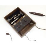 An early 20thC Uvral E-Type High Frequency (Violet-Ray) Electrodes apparatus and instructions,