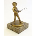 A 20thC cast model of a young boy holding a fishing rod on a square marble base. Approx. 6 3/4" high