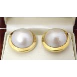 18ct gold earrings set with central pearls. Approx. 7/8" diameter Please Note - we do not make