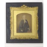 A late 19th century over painted print depicting a portrait of a gentleman lawyer / clergyman with