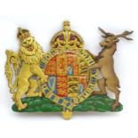 A carved wooden and painted wall plaque depicting the Coat of Arms of Mary of Teck, Queen