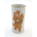 A Chinese brush pot of cylindrical form depicting a figure with a sword and stylised bats, with gilt