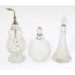 Three assorted silver mounted cut glass scent / perfume bottles, hallmarked Birmingham 1904,