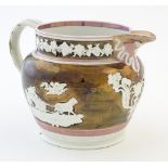 A copper lustre mug with applied relief decoration, a foliate border and a pink lustre rim.