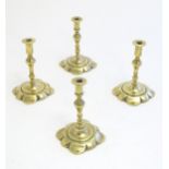 Four 19thC cast brass taper sticks with shaped bases. Approx. 4 3/4" high (4) Please Note - we do