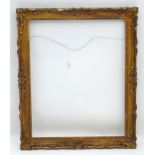 A 20th century gilt and gesso swept frame. Internal measurement approx. 29 3/4" x 23 3/4" Please