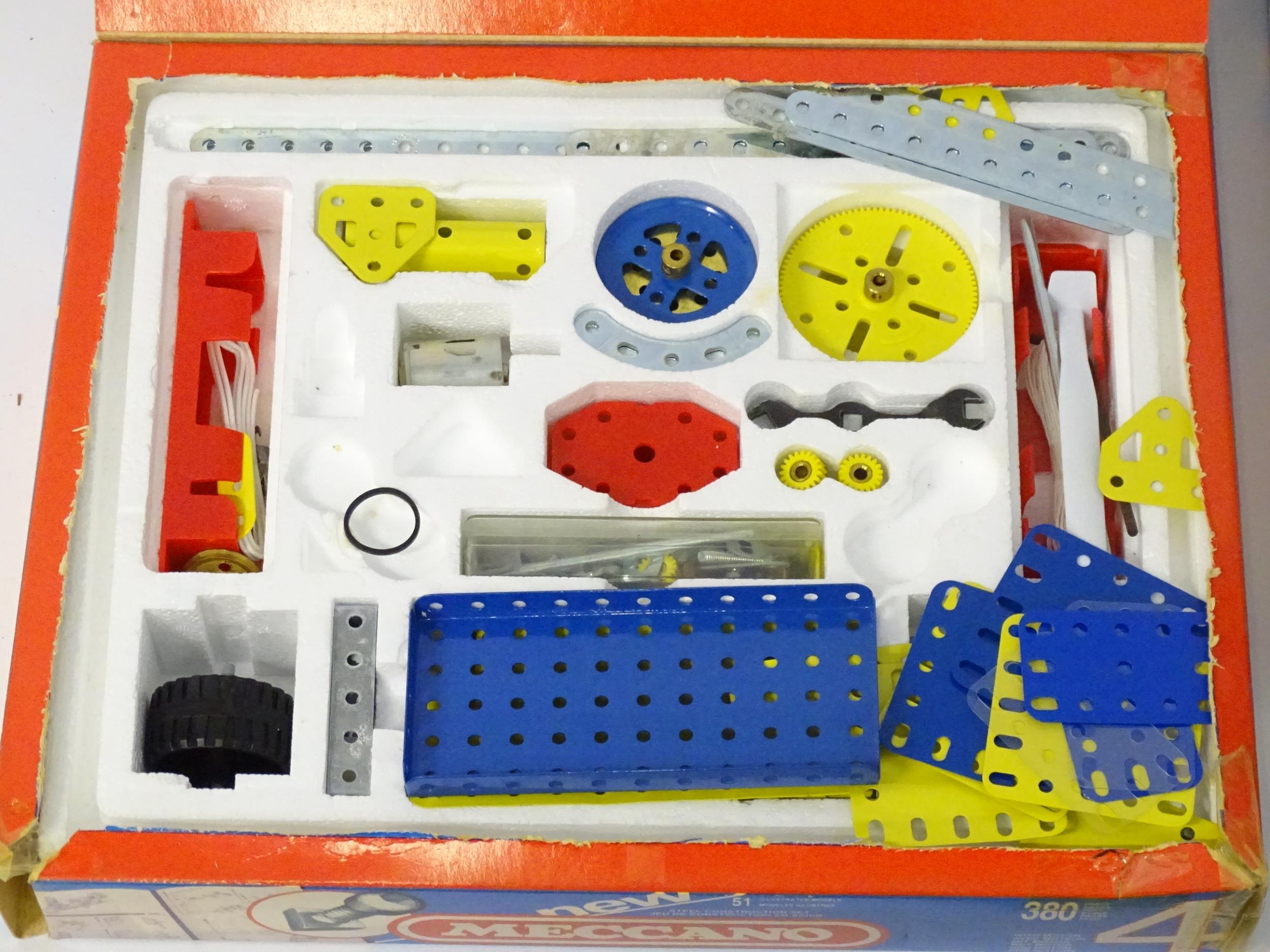 Toys: a large quantity of Meccano, to include cars, helicopter, various wheels, struts, panels - Image 10 of 12