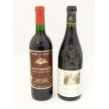 A bottle of Peter A. Sichel Saint-Emilion red wine 75cl, together with a bottle of Domaine Saint