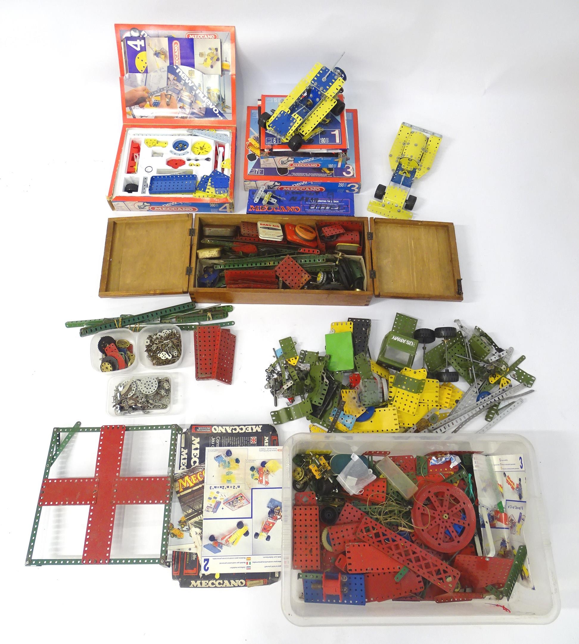 Toys: a large quantity of Meccano, to include cars, helicopter, various wheels, struts, panels