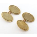 9ct gold cufflinks with engine turned decoration. Please Note - we do not make reference to the