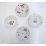 Four Herend pottery dished plates, two in the pattern Market Garden decorated with fruit, flowers,