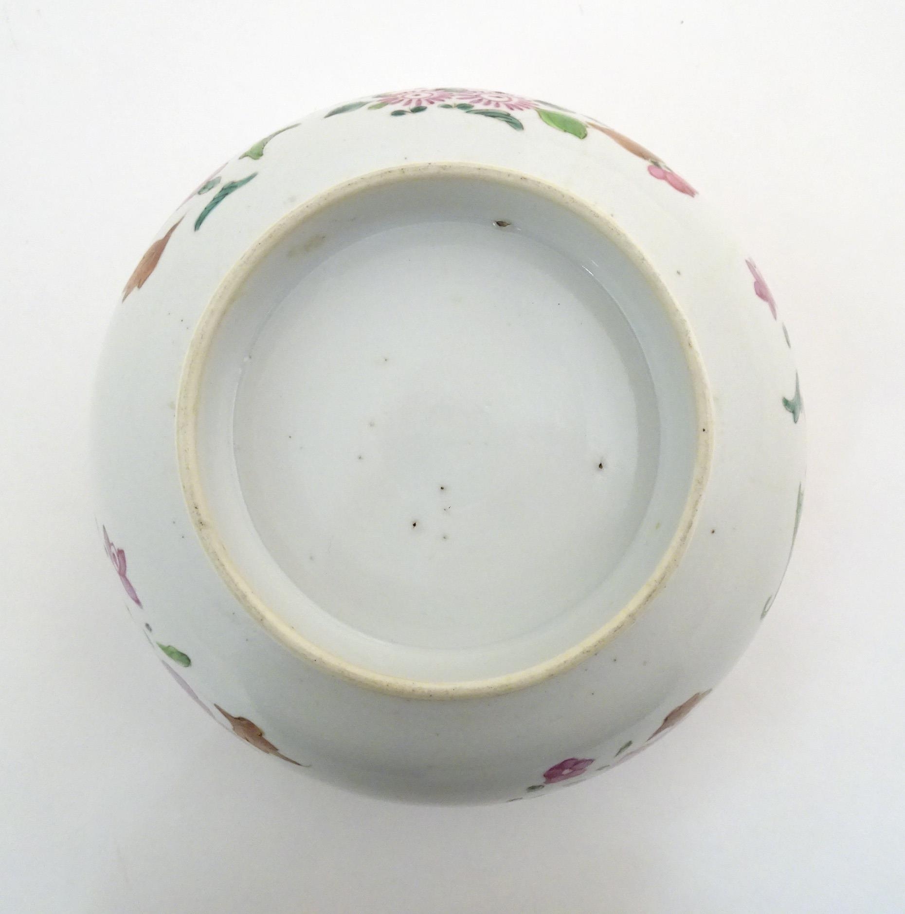 A Chinese bowl decorated with flowers and foliage, with floral motif to centre of interior and - Image 2 of 6