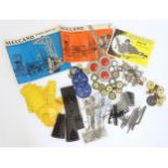 Toys: A quantity of Meccano, to include gears, brackets, wheels, struts, plates, bolts, nuts, etc.