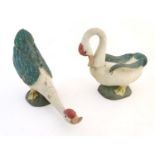 Two primitive carved wooden folk art models of geese with polychrome decoration. Possibly Chinese