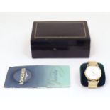 An 18ct gold cased gentleman's Longines wrist watch, serial no. 10977219. With original box and