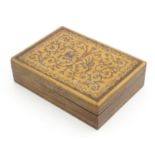 A 20thC parquetry box with scrolling foliate and stylised bird detail. Approx. 1 1/2" x 5 1/2" x