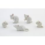 Five Continental miniature models of mice, each mouse depicted in a different position. Marked GDR