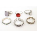 Six assorted silver rings, one with set with cubic zirconia. (6) Please Note - we do not make