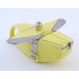 An Art Deco Sadler novelty teapot modelled as a yellow T-Plane / aeroplane. Approx. 8 1/2" long