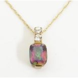A 9ct gold pendant and chain, the pendant set with mystic topaz and white stones. Approx 1/2" long