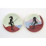 Two Australian small plates designed by Martin Boyd decorated with aboriginal male figures in