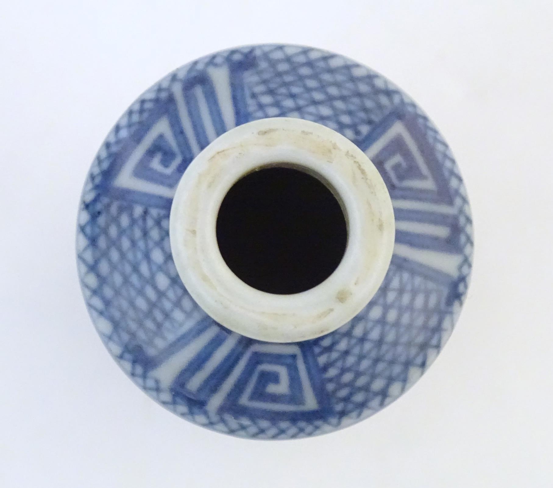 A Chinese snuff bottle with blue and white figures and a mottled ground. Character marks under. - Image 6 of 7