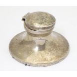 A silver inkwell of capstan form, hallmarked Birmingham 1915, maker WJ Myatt & Co. Approx. 2 3/4"