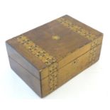 A 19thC walnut writing box with geometric marquetry / parquetry inlay. Approx. 6" x 13 3/4" x 9 1/4"