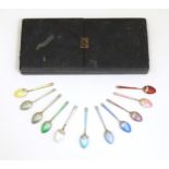 11 Art Deco silver teaspoons with guilloche enamel decoration to handles. Hallmarked Birmingham 1959