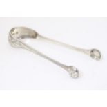 Victorian silver tongs, hallmarked Glasgow 1874, maker William Coghill. Approx. 4 3/4" long Please