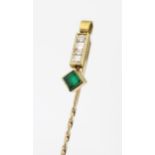 A 18ct gold stick pin / brooch set with diamonds and emerald. Approx. 2 3/4" long Please Note - we